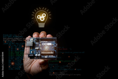 Arduino controller board element photo in dark background with infographic details. photo