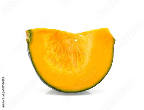 Slice of pumpkin isolated on white background.