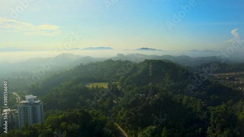 Aerial Drone 4K UHD Footage Of 5G Communication tower on top of hill view. 4K UHD, shot with anamorphic lens