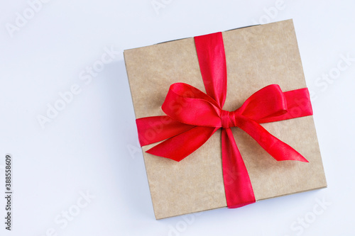 gift box with a red bow, on a white background