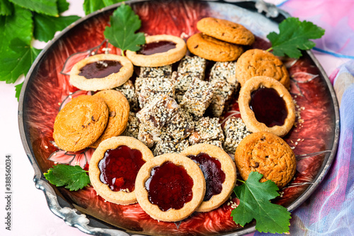 cookies with jam and Turkish delight on a beautiful dish