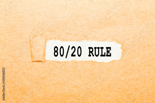 text 80 20 RULE on a torn piece of paper, business concept