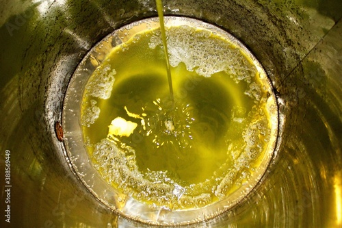 Schilderij op canvas Extra virgin olive oil extraction process in olive oil mill located in the outskirts of Athens in Attica, Greece