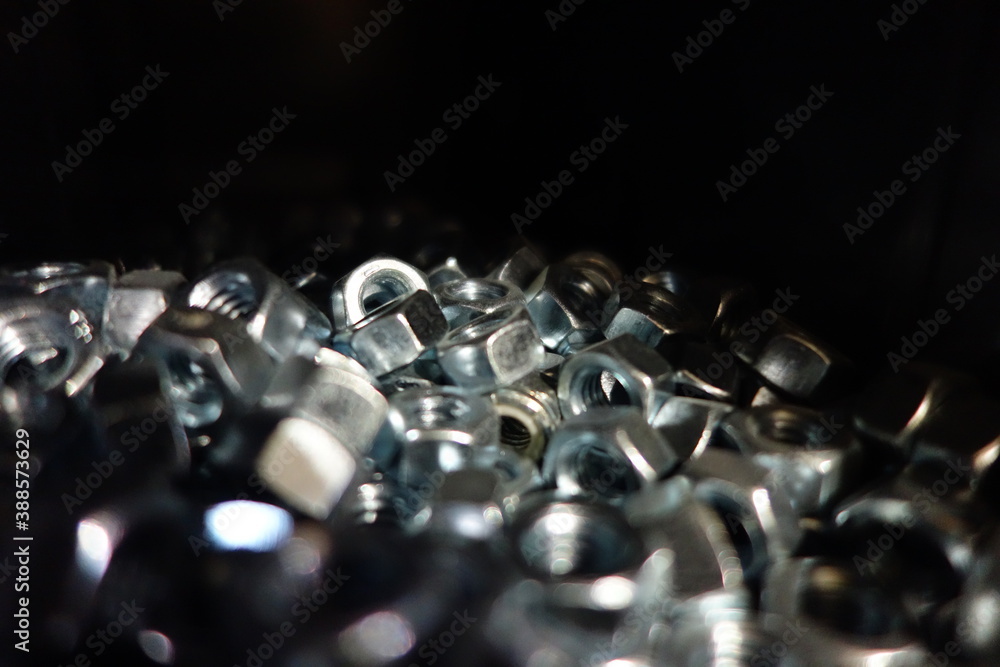 Nuts and bolts close up in garage bin Nuts and bolts close up in garage bin