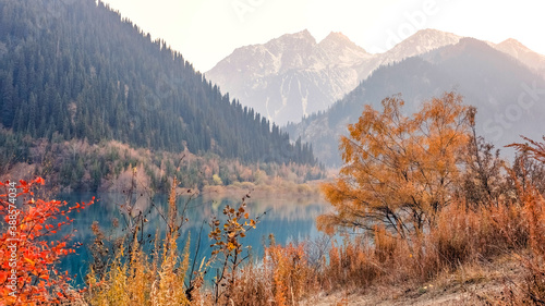 Fototapeta Naklejka Na Ścianę i Meble -  Landscape - a beautiful mountain lake in autumn colors. The concept of local travel. Almaty, Kazakhstan