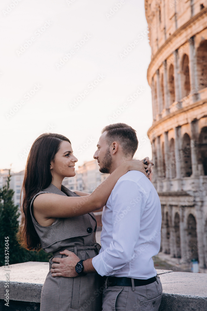 The love story of a guy and a girl on the city streets. Young people travel to Europe. Summer walk around the city.