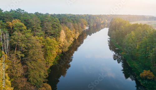 River and autumn forest aerial view