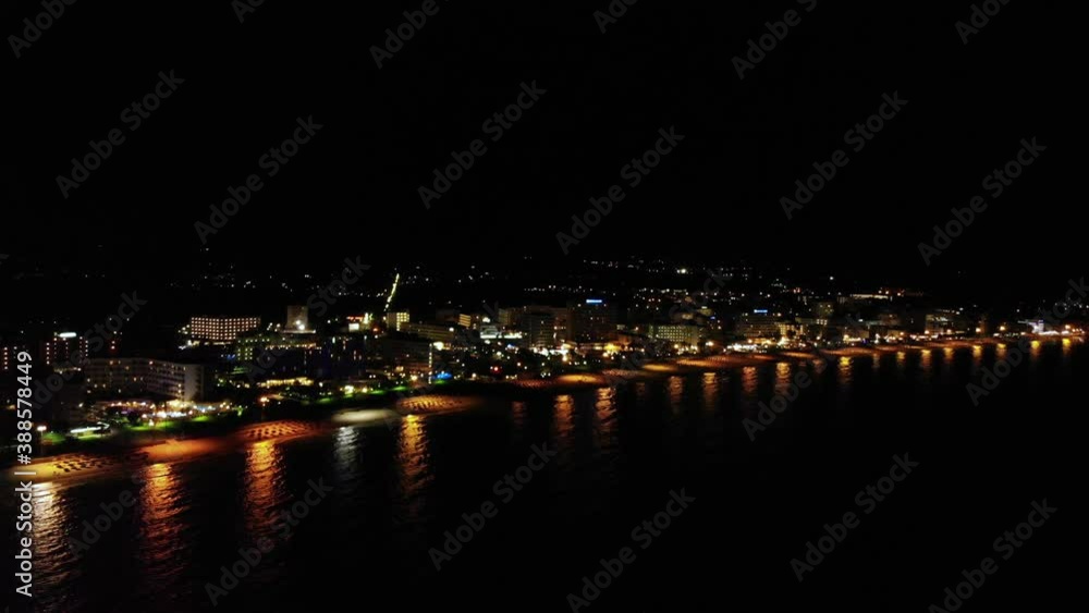 Aerial view of Cala Millor beach illuminated at night, luxury touristic villlage of the Island of Mallorca, Spain Aerial view of Cala Millor beach illuminated at night, luxury touristic villlage of the Island of Mallorca, Spain