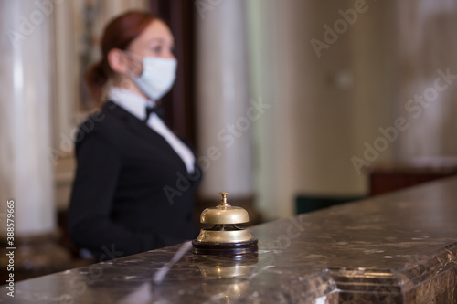 the staff of an elite hotel serves guests