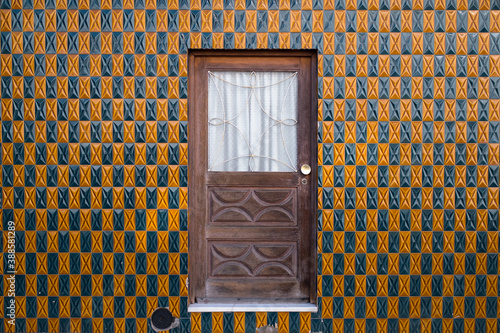 Traditional azulejos facade of the house in Portugal.