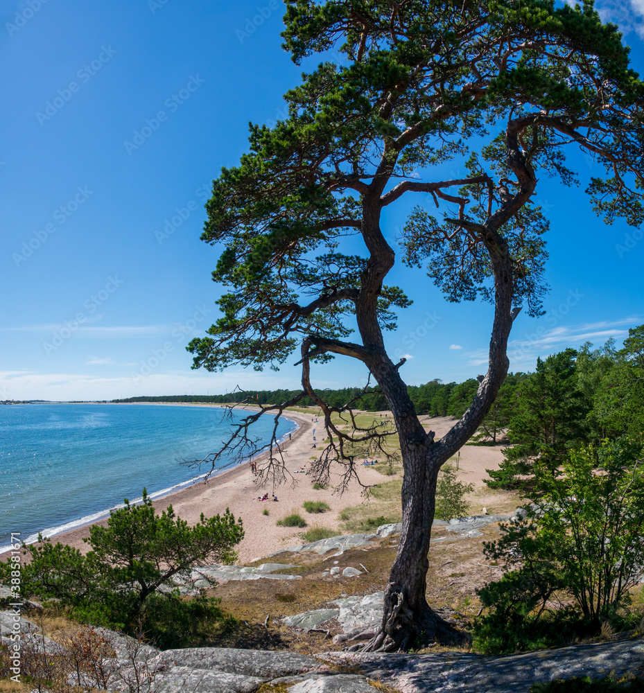 Sunny sand beach at seaside of Hanko town in southmost part of Finland