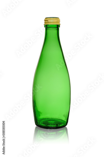 An empty glass bottle with a green tinge, closed with a metal lid. Isolated on a white background with reflection