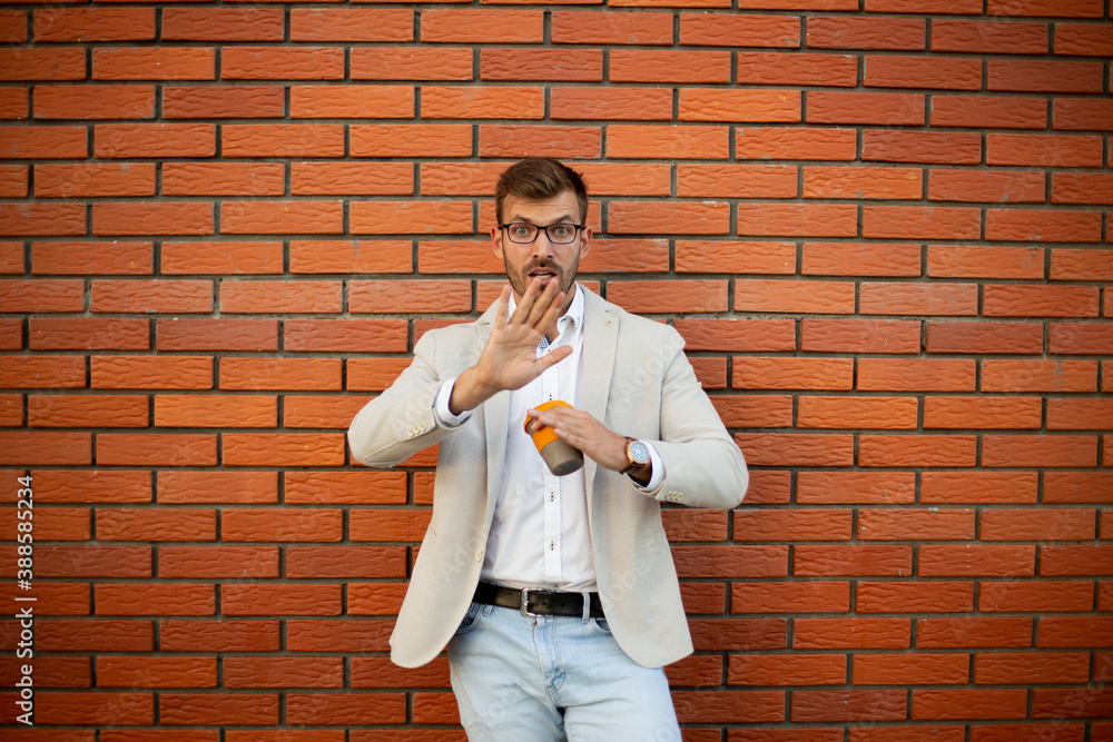 Portrait of a handsome man who saying STOP!!! Portrait of a handsome man who saying STOP!!!