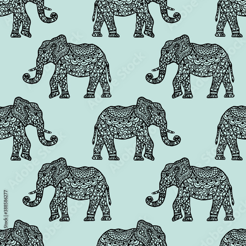 Seamless pattern. Abstract vector  illustratiosn with Indian monochrome elephants on blue background photo