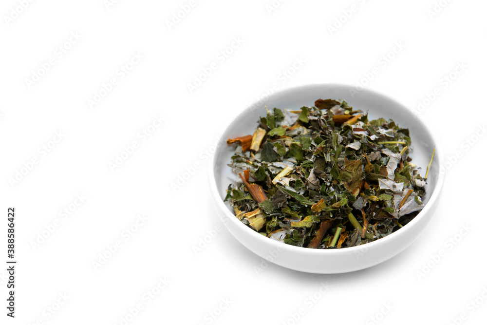 Leafy natural green tea on a white background Leafy natural green tea on a white background