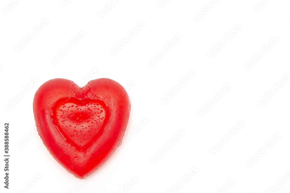 Handmade heart made from soap on a white background Handmade heart made from soap on a white background