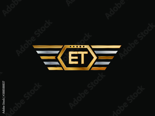 ET wing shape Initial logo letter design art logo, gold color on black background