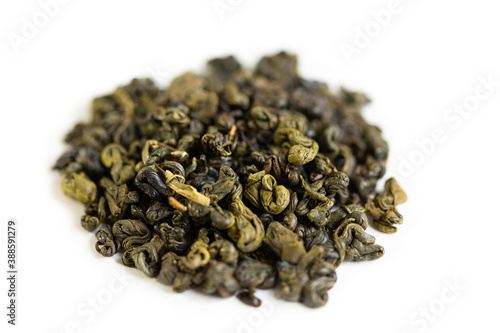 Leafy natural green tea on a white background