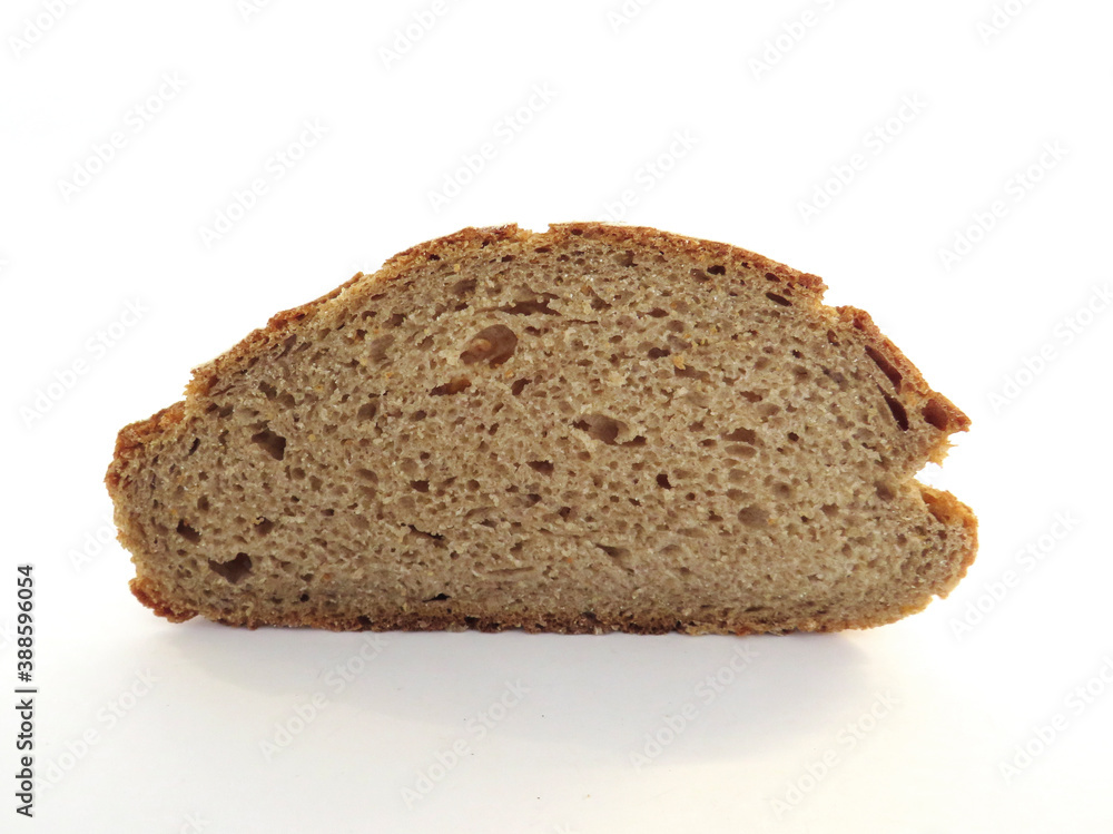 Front view of slice of artisan rye bread isolated on white background. Close-up of a piece of freshly baked artisan whole wheat bread. Rustic dark rye sourdough bread upright. Front view of slice of artisan rye bread isolated on white background. Close-up of a piece of freshly baked artisan whole wheat bread. Rustic dark rye sourdough bread upright.