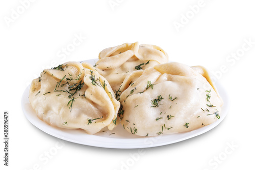 Steamed manta rays with meat sprinkled with dill in a plate on a white isolated background