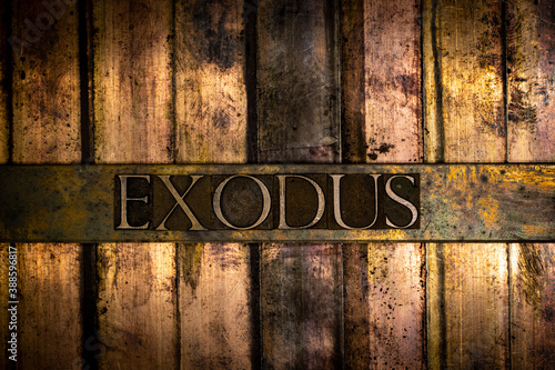 Photos Exodus text message on vintage textured grunge bronze background