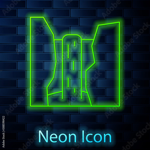 Glowing neon line Algar waterfall icon isolated on brick wall background. Region Alicante. Spain. Vector.
