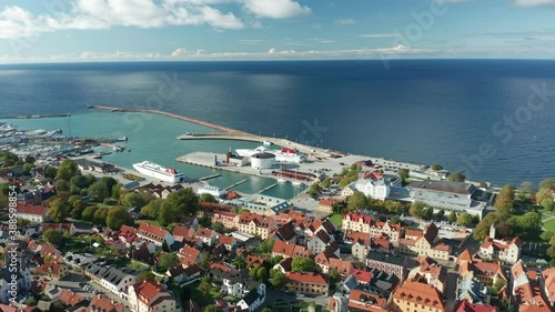 Harbour port aerial drone footage, flying above moored ferrys in Visby, Gotland photo