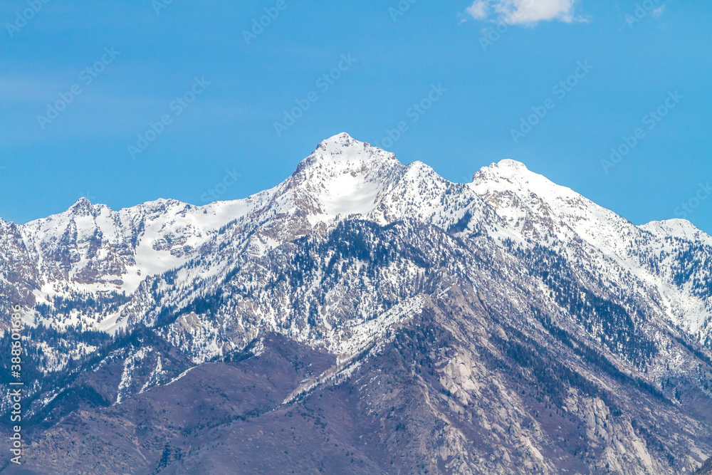 The Wasatch (Uinta) mountain range located along the east side of the Salt Lake valley (Utah). This peak is called Twin Peaks.