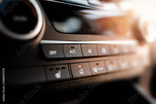 Interior view of a modern new car. Climatronic or air conditioner system. photo