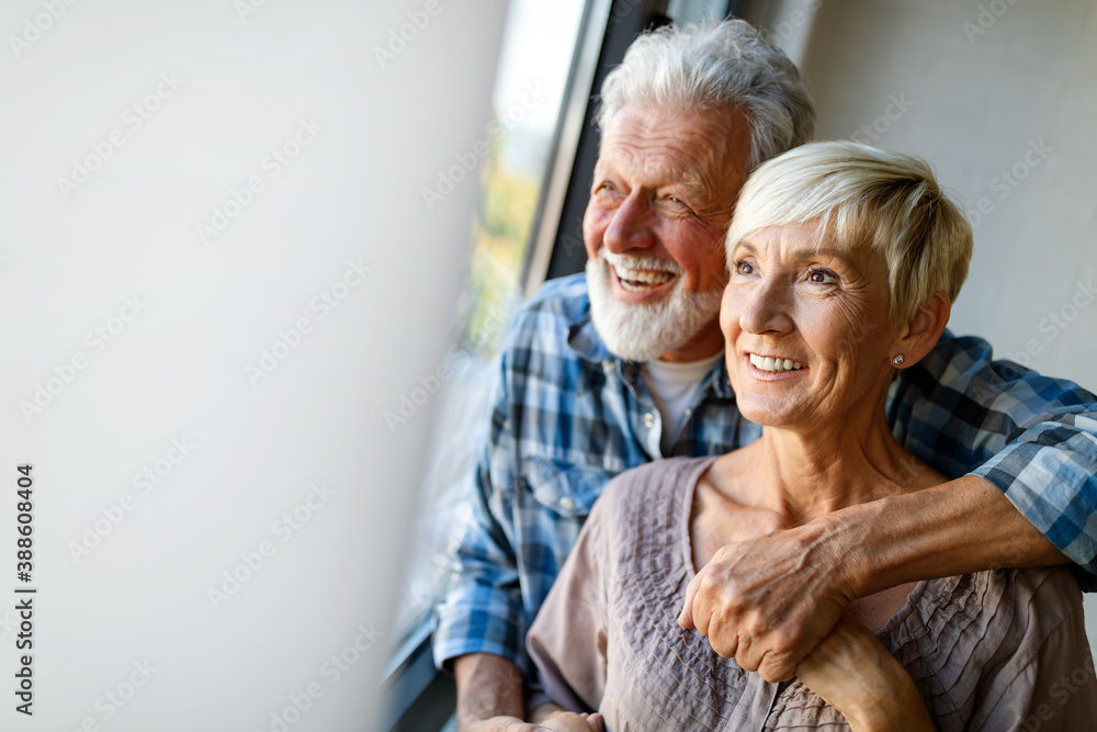 Elderly couple in love. Senior husband and wife hugging and bonding with true emotions