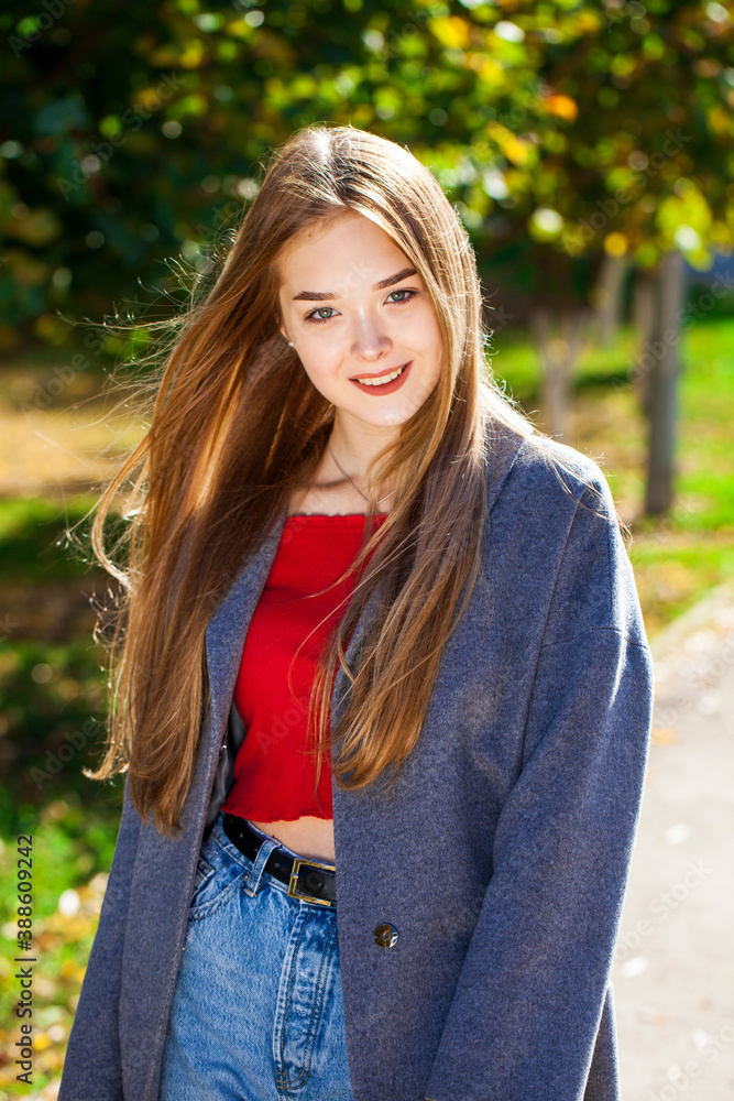 Portrait of a young beautiful blonde woman in gray coat Portrait of a young beautiful blonde woman in gray coat