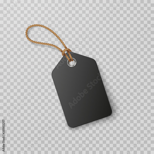 Black tag with rope isolated on transparent background. Cardboard label, paper sale or discount sticker. Vector 3d blank price, promo offer mockup.