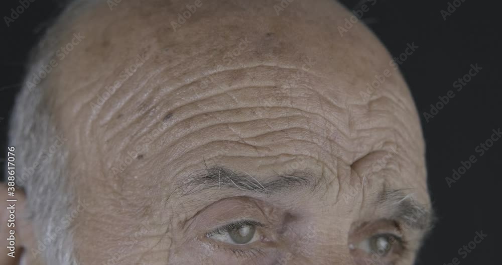 Retired old man's forehead lines. Aging concept, dermatology and face skin care. Retired old man's forehead lines. Aging concept, dermatology and face skin care.