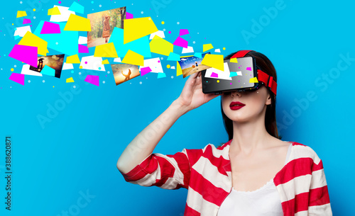 woman with virtual reality gadget photo