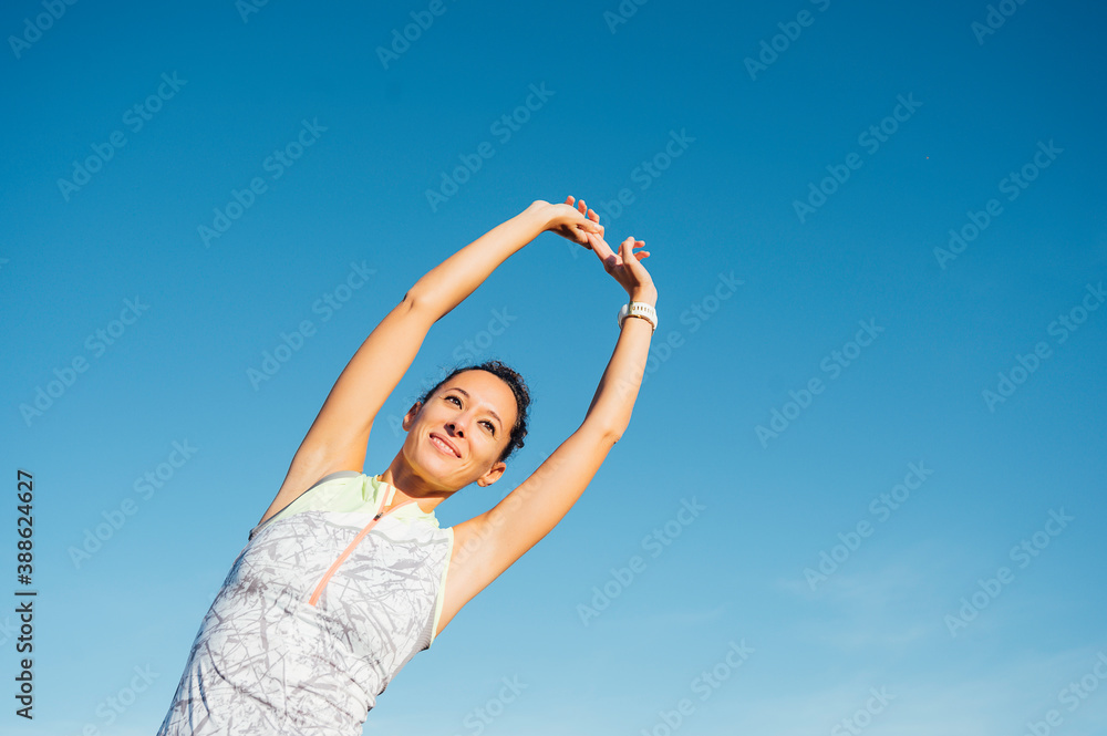 female athlete performs exercises with arms female athlete performs exercises with arms