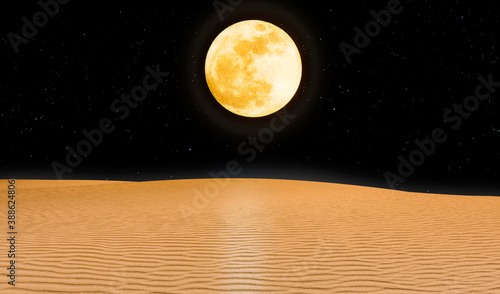 Big yellow moon in the starry sky, over the night desert