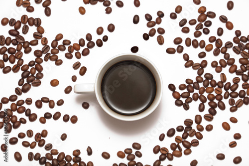 Coffee and coffee beans on white background.