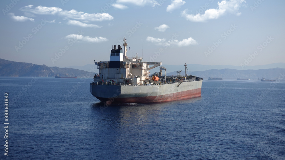 Detail photo of tanker ship anchored near port of Piraeus and island of Salamina, Saronic gulf, Attica, Greece Detail photo of tanker ship anchored near port of Piraeus and island of Salamina, Saronic gulf, Attica, Greece