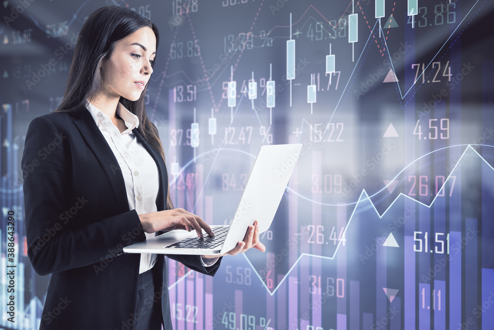 Young business woman with laptop on the background of growing financial graph, investment concept Young business woman with laptop on the background of growing financial graph, investment concept