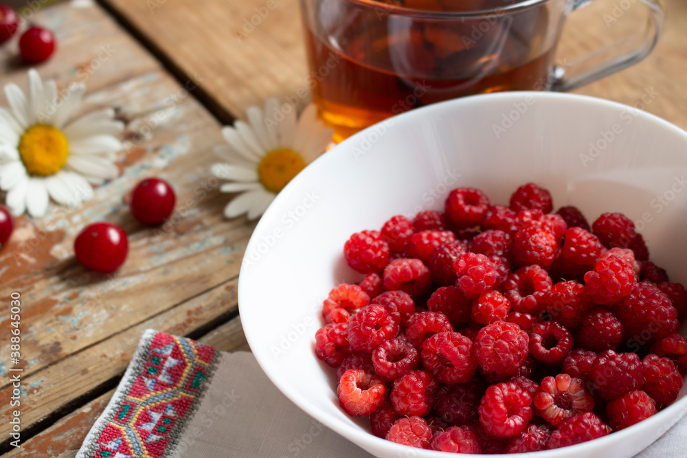 Wild raspberries fresh with tea Wild raspberries fresh with tea