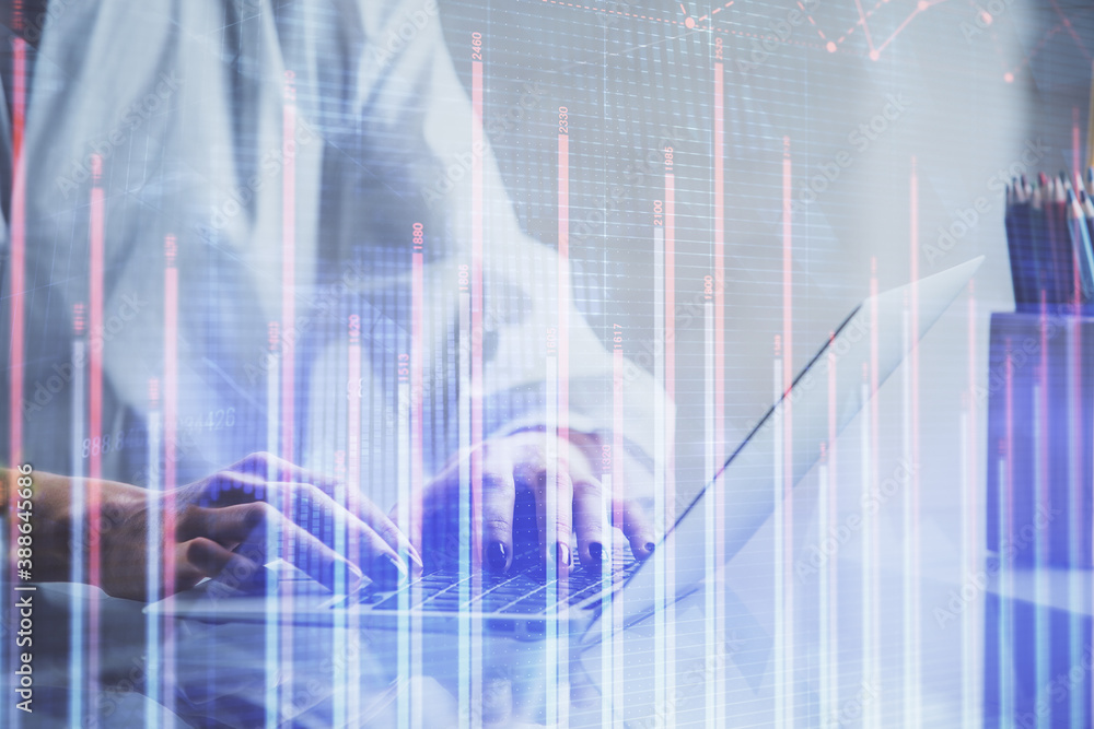 Double exposure of woman hands typing on computer and forex chart hologram drawing. Stock market invest concept. Double exposure of woman hands typing on computer and forex chart hologram drawing. Stock market invest concept.