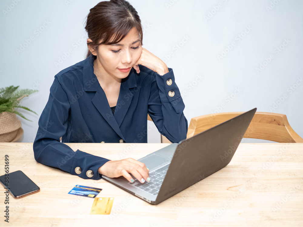businesswomen ceo manager company office blue suit is working investment digital marketing technology investment and shop online at home social distancing on new normal effect covid-19 corona businesswomen ceo manager company office blue suit is working investment digital marketing technology investment and shop online at home social distancing on new normal effect covid-19 corona