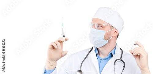 Doctor holding a viol with vaccine against corona virus.