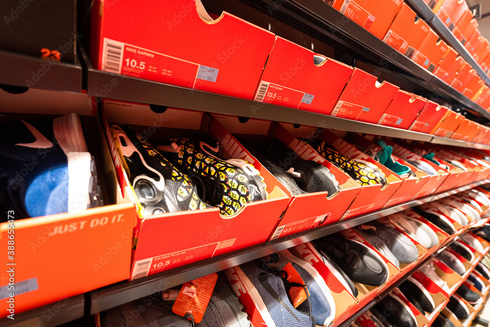 Foto de Bangkok / Thailand - November 2019 : Nike sport shoe in vary models  and series are on sale in the factory outlet store as special discount  price. do Stock