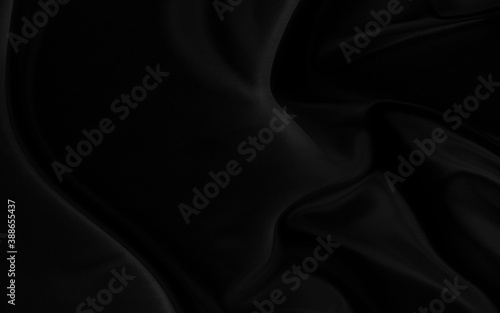 Black gray satin dark fabric texture luxurious shiny that is abstract silk cloth background with patterns soft waves blur beautiful.