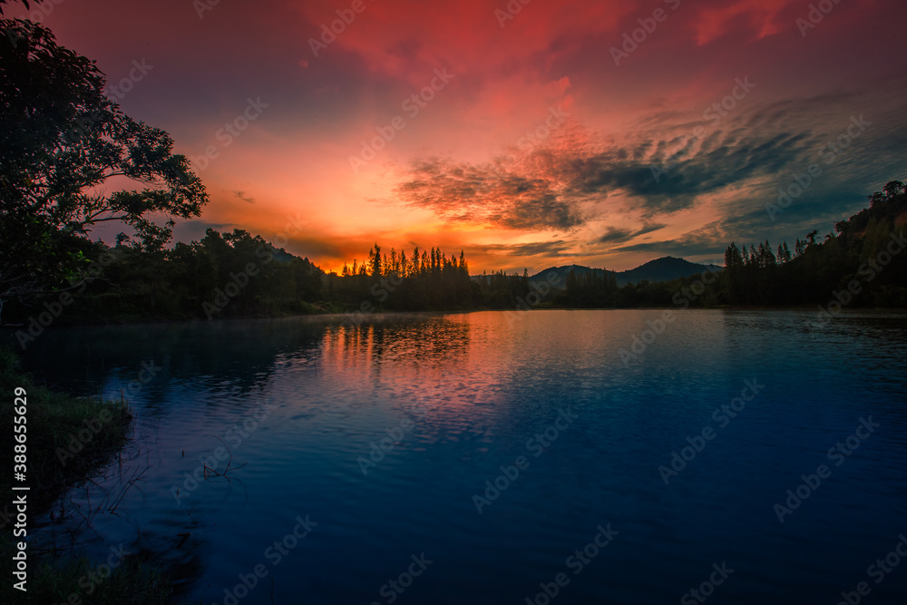 Natural panoramic lakeside nature background, beautiful twilight sunset, blurred meadow wind. Cool weather in the viewpoint or tourist attraction