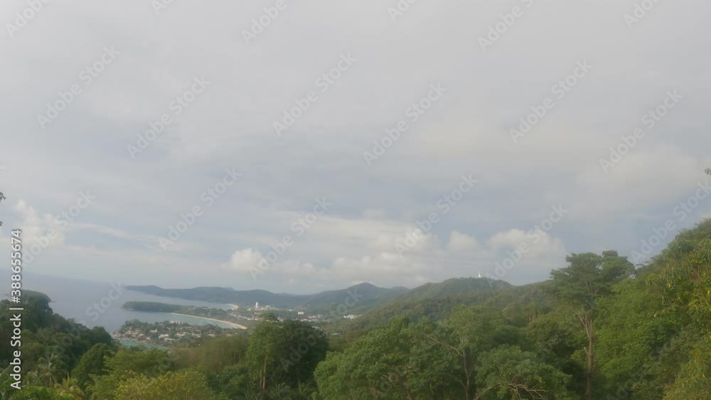 Kata Noi & Karon beach viewpoint on tropical summer mountain & hill top with lush green tree or rain-forest plant on cloudy sky with fluffy white clouds & cumulus cloudscape, 4K uhd TimeLapse Kata Noi & Karon beach viewpoint on tropical summer mountain & hill top with lush green tree or rain-forest plant on cloudy sky with fluffy white clouds & cumulus cloudscape, 4K uhd TimeLapse