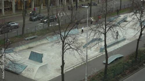 Boys practicing at Skatepark Westblaak in Rotterdam photo