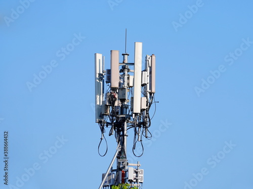 Telecommunication tower of 4G and 5G cellular. Macro Base Station. 5G radio network telecommunication equipment with radio modules and smart antennas mounted on a metal. 