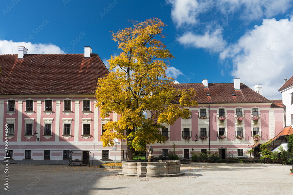 At the Courtyard of Trebon Castle. 
Renaissance palace in Trebon. Trebon is a historical town in South Bohemian Region. Czech Republic.
Nice sunny day during summer or autumn season.